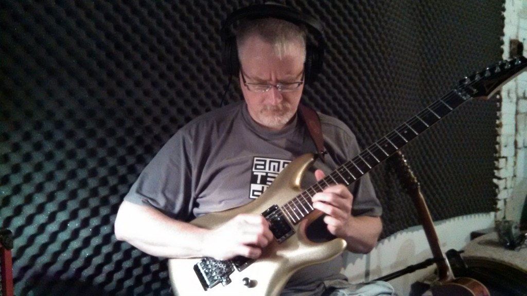Bill Shannon laying down rough guitar tracks in The Cave.