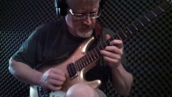Bill Shannon working on new guitar parts in The Cave.
