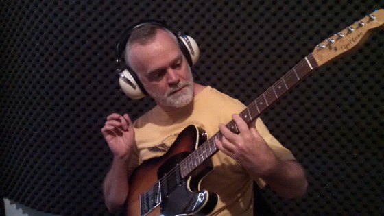 William "Billy" Spillane working on guitar parts for Circuline's second album.