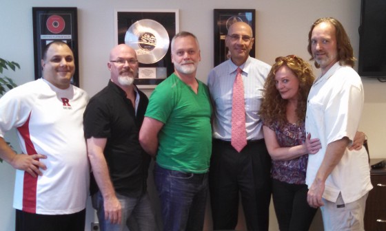 Circuline manager Thomas Palmieri, Darin Brannon, William "Billy" Spillane, attorney Ronald Bienstock, Natalie Brown, and Andrew Colyer. Absent from the photo is bassist Paul Ranieri.