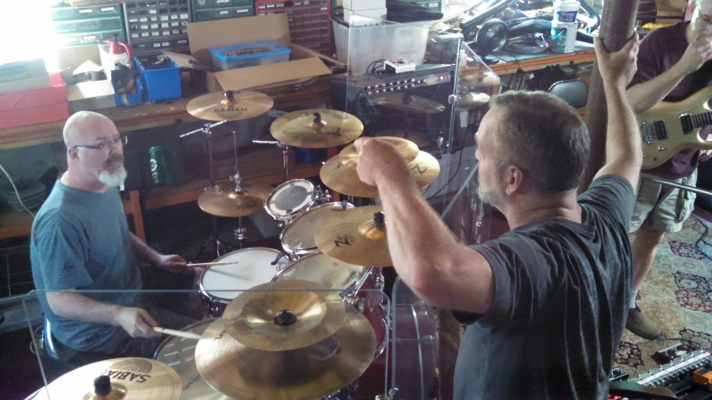 Darin Brannon and Billy Spillane work out some drum parts. 