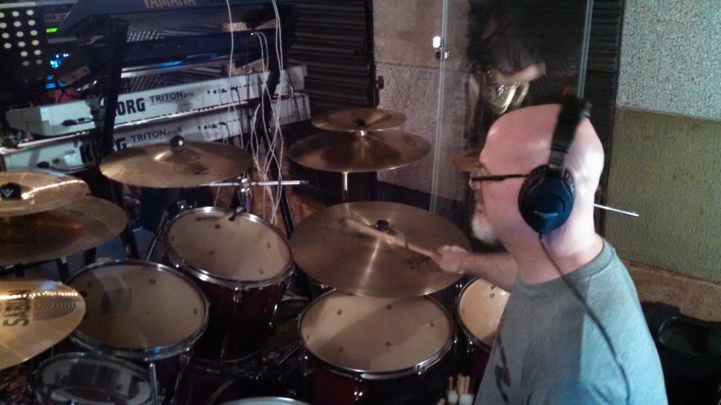 Darin Brannon works out his drum parts in The Cave.