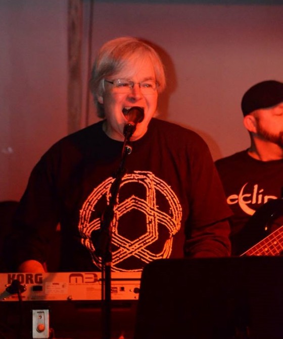 Wes Ostiguy wearing a Circuline shirt at one of his gigs with Eclipse